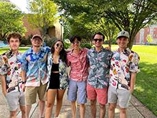 Declan Byrne, Scott Elliott, Jarrett Irwin, Claire Jacobs, Jeremy Ling and Patrick Sullivan posed outside